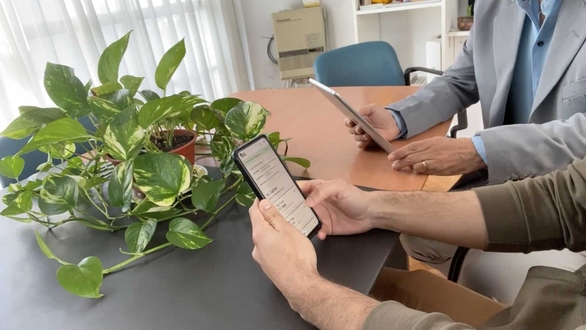 Image of a UX research session to test a UI prototype